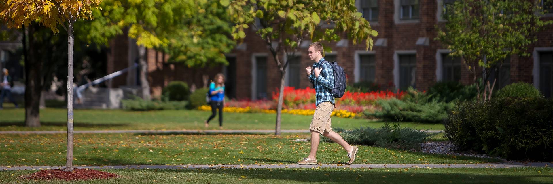 walking across campus during fall