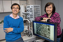 Julia Zhao posing for a picture in a lab.
